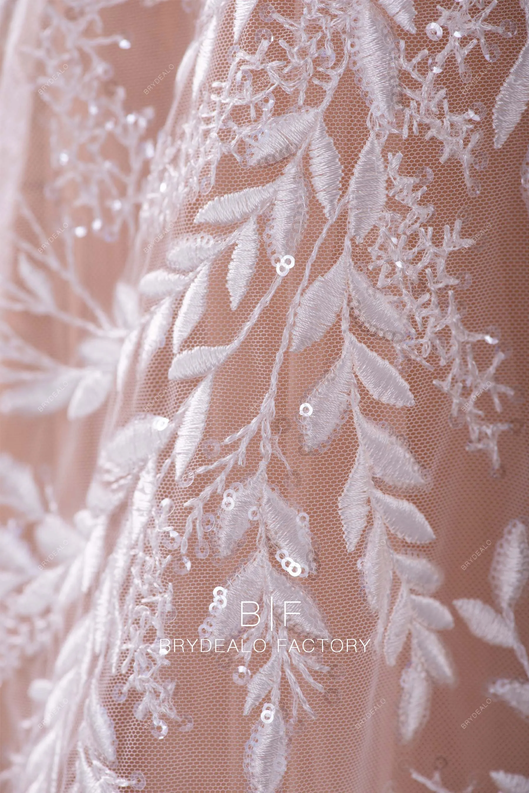 Designer Shimmery Leaf Motif Embroidery Lace Fabric